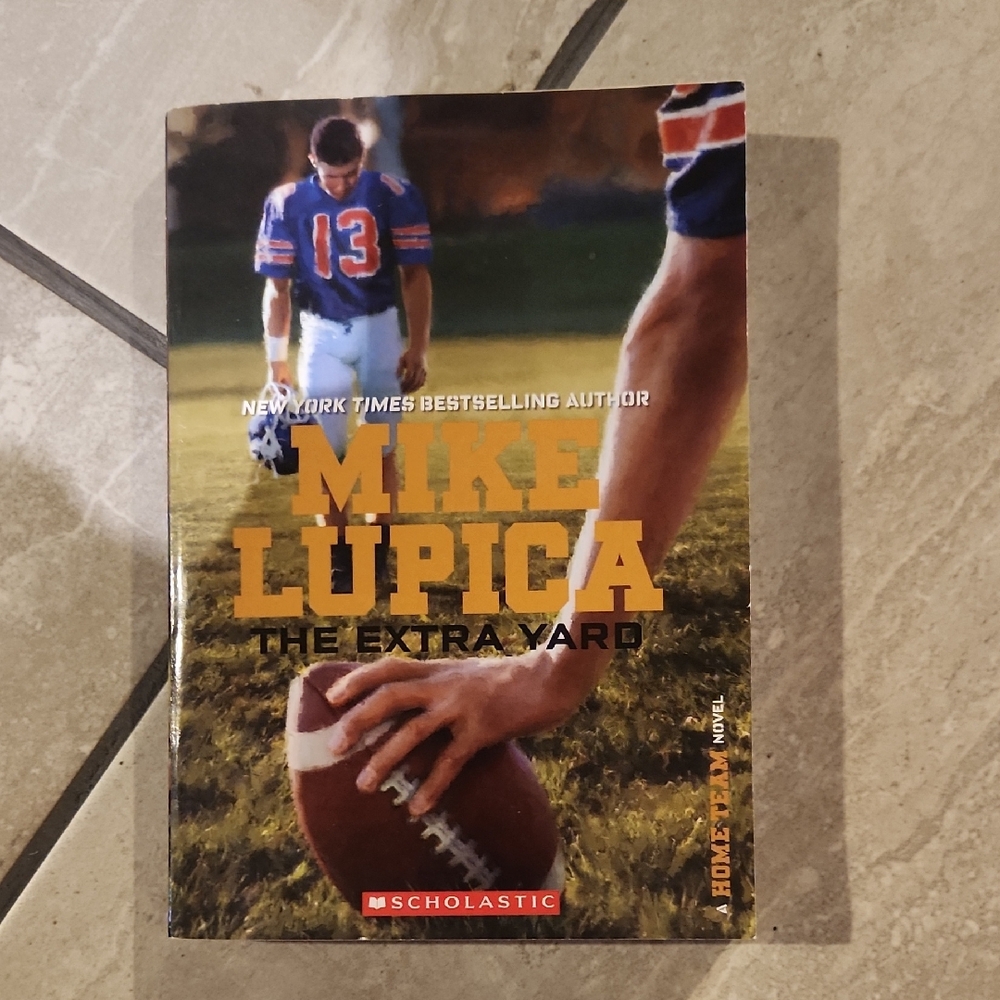 Scholastic's The Extra Yard by Mike Lupica - Blue and Orange Cover